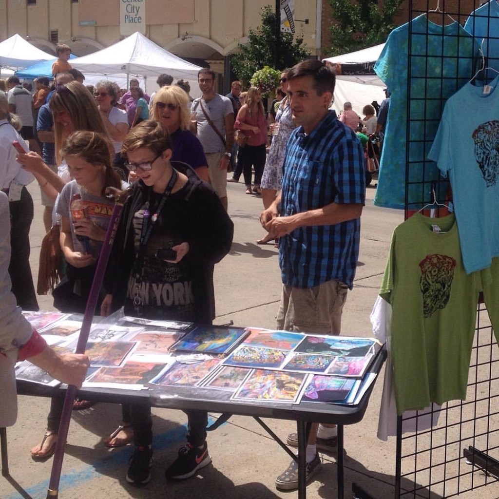 Artist Russell frantom merch for sale at an event in 2018 