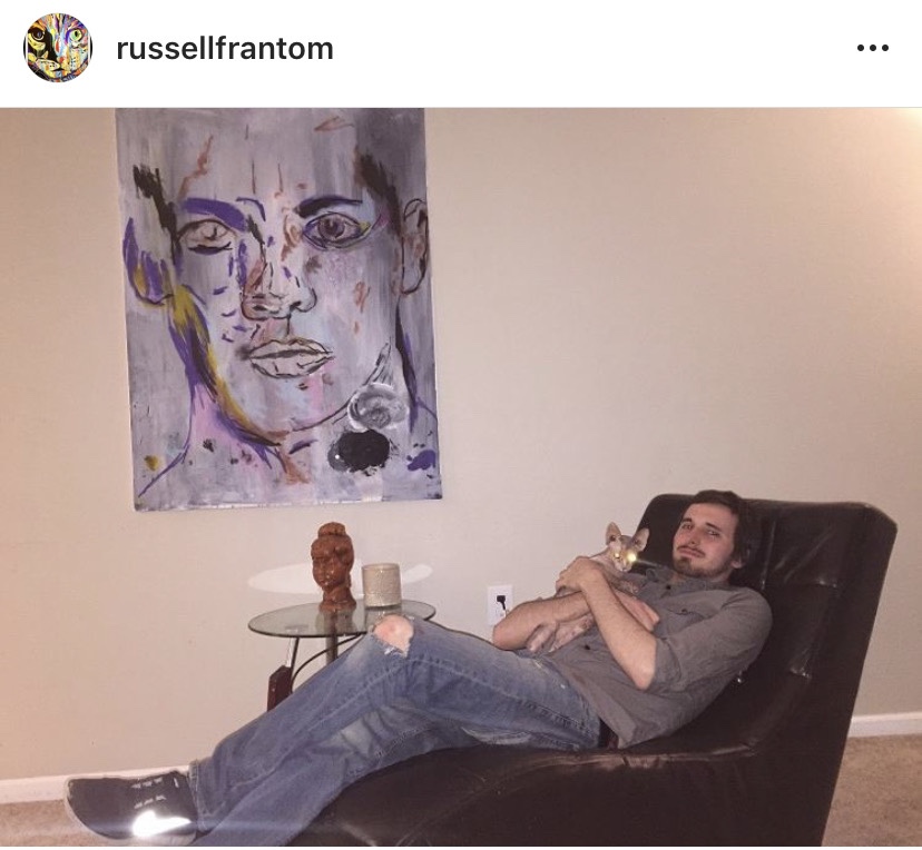 Russell frantom with bald cat 