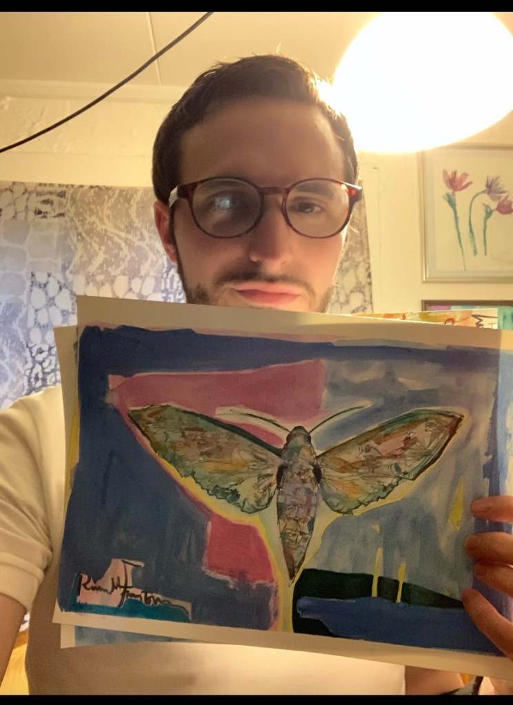 Visual artist (Chicago, south bend) Russell Frantom holds a painting he made of a moth. Watercolor on paper. 
