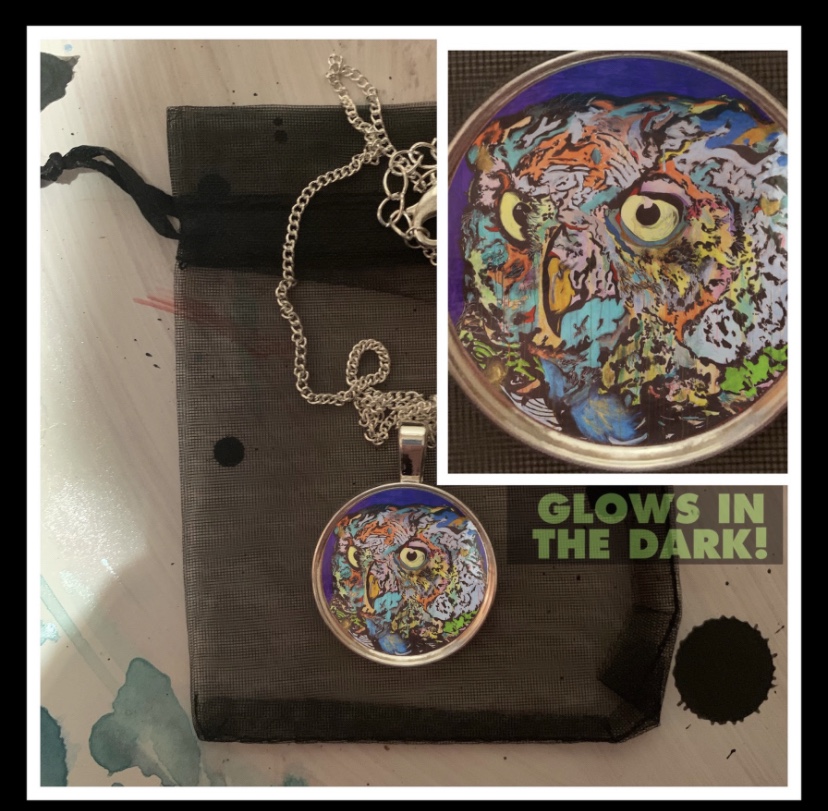 Russell frantom painting of an owl featured on a necklace 